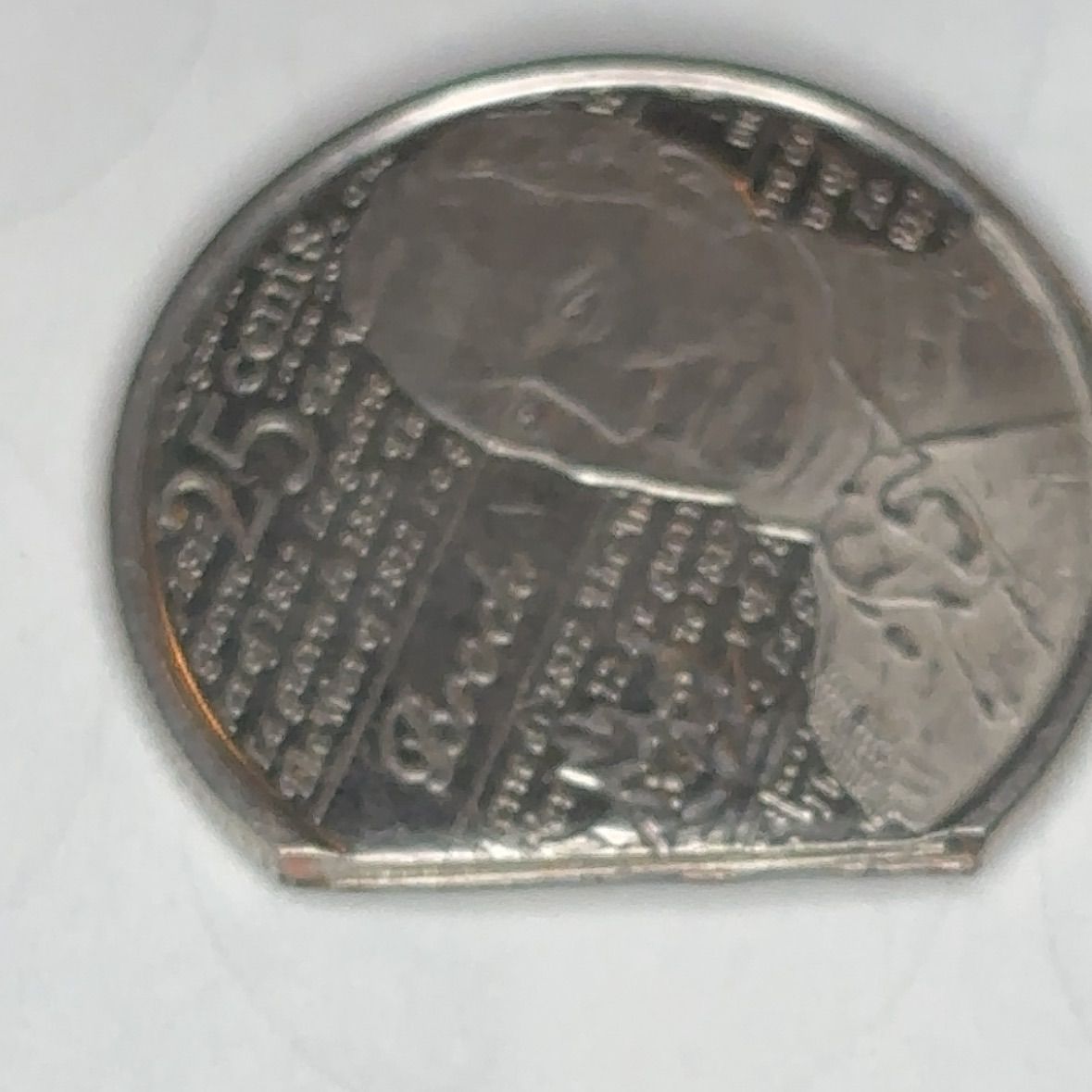 Clipped Planchet? 2012 “Brock” CAN quarter. - Newbie Coin