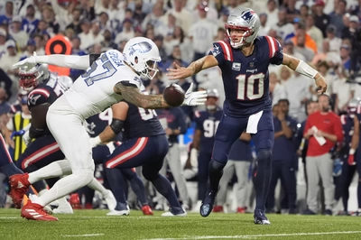 AJ Epenesa, who had a nice first half, applies pressure and forces Drake Maye to throw the ball away for an incomplete pass.