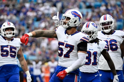 AJ Epenesa and his Defensive teammates celebrate his 4th quarter sack against the toothless Panthers.