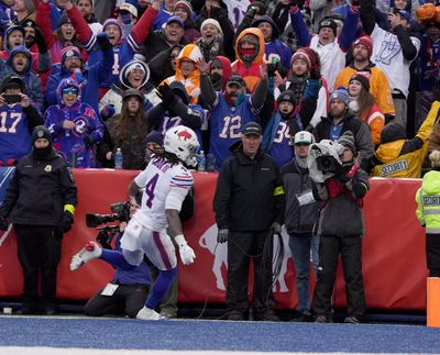 James Cook completes his catch and run to the end zone as he scores his lone TD for the game.