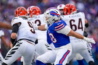 Matt Milano chases down Joe Burrow in the second half as the snow stops, clearing the way for the Bills second big comeback victory of the year against AFCN opponents.