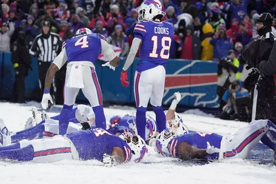 James Cook Contemplates Making a Snow Angel to Celebrate Jackson Hawes' TD, While New Bill Brandin Cooks Looks on
