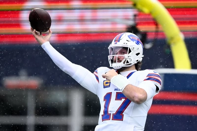 Josh Allen warms up in the pre-game New England snow....pffffffft, you call that snow ?!?!?!?!