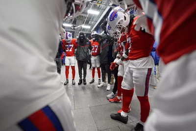Taron Johnson leads his Devensive teammates in a moment of prayer before they head out for the pregame warm ups. Hey Taron, next time invite the Offense to join you too, please.