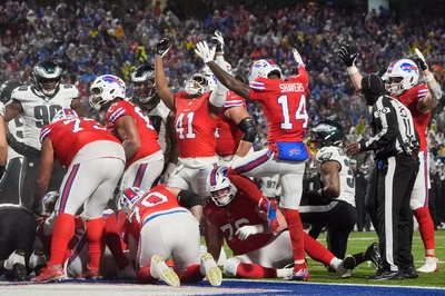 Teammates celebrate one of Josh Allen's late game touchdowns that brought the Bills close in the final minutes; and totally saved my Fantasy Championship game : )