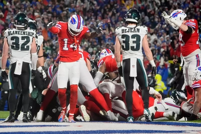 Somewhere under that mass of humanity lies Josh Allen holding on to a football that has broken the plane of the goal line.