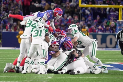 DB Jordan Hancock has a bird's eye view of teammates tackling the Jest ball carrier.