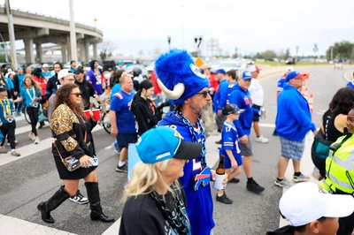 Harkening back to September and October tailgates in Orchard Park, Jeff Hunn joins a group of fellow Bills fans as they enter the Jags stadium to watch the Bills Wild Card victory.