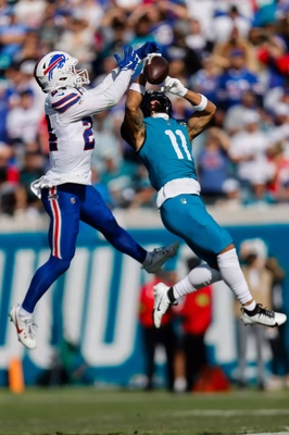 Cole Bishop had the leap to match, but couldn't break up this long completion to Parker Washington.