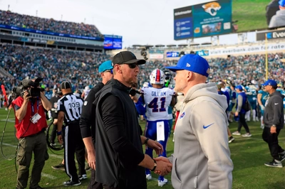Liam Coen and Sean McDermott exchange a friendly handshake after the Bills victory. Two Head Coaches with similar teams, but only one has Josh Allen.