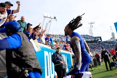 Shaq Thompson headed towards the stands to celebrate the Playoff victory with the Bills faithful.