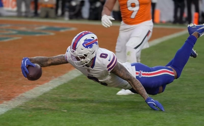 Keon Coleman does his best Josh Allen imitation as he defies gravity and stretches the ball out for a touchdown.
