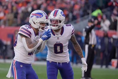WRs Khalil Shakir and Keon Coleman make sure they have their assignments set as they line up for a 1st quarter play.