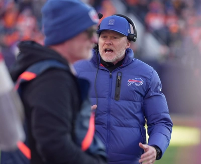 Sean McDermott implores the Referee to slow the game down and review a controversial turn over, but his admonishments are ignored. Come on Coach, there's another game about to start and that means there's money to be made.